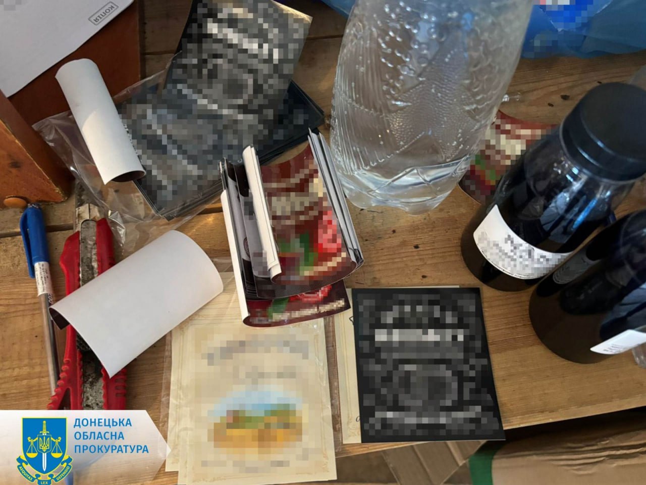 Зображення посту: На Донеччині судитимуть жінку, яка організувала цех із виробництва фальсифікованого алкоголю